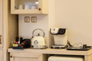 A kitchen or kitchenette at Vip Lepanto Castle Suites