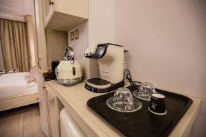 A kitchen or kitchenette at Vip Lepanto Castle Suites