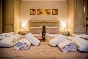A bed or beds in a room at Vip Lepanto Castle Suites