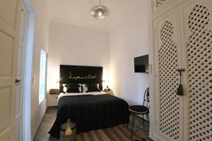 Letto o letti in una camera di Riad CK Medina