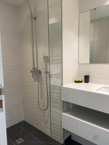 Koupelna v ubytování Meherio - Bel Appartement vue mer à TAHITI