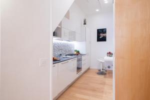 Kuchyň nebo kuchyňský kout v ubytování Wanderlust by PortofinoHomes