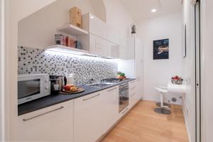 Kuchyň nebo kuchyňský kout v ubytování Wanderlust by PortofinoHomes