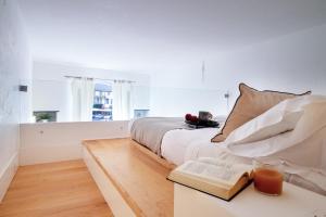 Postel nebo postele na pokoji v ubytování Wanderlust by PortofinoHomes