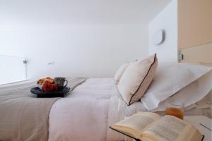 Postel nebo postele na pokoji v ubytování Wanderlust by PortofinoHomes