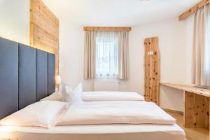 Postel nebo postele na pokoji v ubytování Superior Apartments Marialisa Tulpe