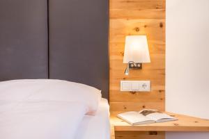 Postel nebo postele na pokoji v ubytování Superior Apartments Marialisa Tulpe