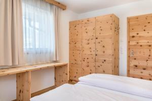 Postel nebo postele na pokoji v ubytování Superior Apartments Marialisa Tulpe