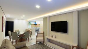 En TV eller et underholdningssystem på Apartamento completo - Vila A