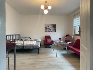 Posezení v ubytování Srní- Červený byt/ dvojdomek u hotelu Vydra