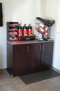 a counter in a room with fire hydrants on it at Motel 6 Hattiesburg, MS in Hattiesburg