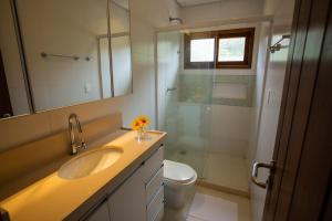 Ванная комната в Suites Amma Noronha