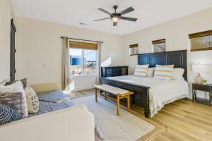 a bedroom with a bed and a couch at Light on the Hill in Paso Robles