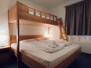 Posteľ alebo postele v izbe v ubytovaní Chalet an der Piste