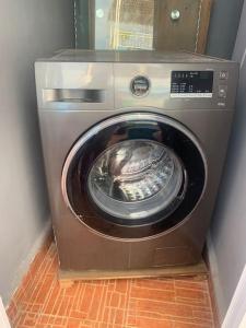 a washing machine is sitting in a room at Dar lmrama Guest House Fes Medina Morocco in Fès