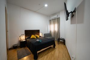 Postel nebo postele na pokoji v ubytování Apartamento San cayetano