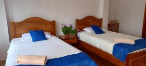 Voodi või voodid majutusasutuse Hotel Sula Sula toas