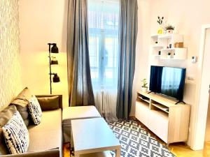 Postel nebo postele na pokoji v ubytování Stunning new 1 bedroom apartment in Prague centre
