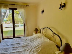 Кровать или кровати в номере Charming Villa Saint-Jean-Cap-Ferrat