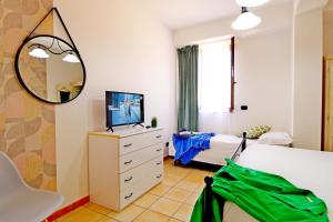 Posteľ alebo postele v izbe v ubytovaní Capo d'Orlando Apartments - Cipria