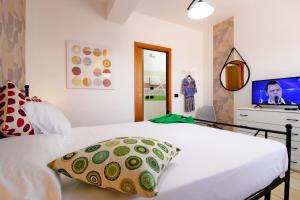 Posteľ alebo postele v izbe v ubytovaní Capo d'Orlando Apartments - Cipria