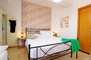 Posteľ alebo postele v izbe v ubytovaní Capo d'Orlando Apartments - Cipria