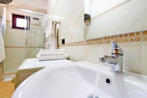 Kúpeľňa v ubytovaní Capo d'Orlando Apartments - Cipria