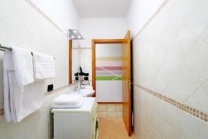 Kúpeľňa v ubytovaní Capo d'Orlando Apartments - Cipria