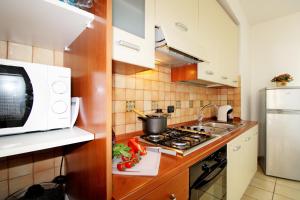 Kuchyňa alebo kuchynka v ubytovaní Capo d'Orlando Apartments - Cipria