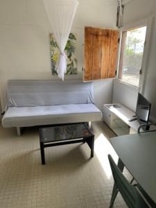 Letto o letti in una camera di La Colline Business & Tourisme