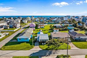 an aerial view of a residential neighborhood with houses at Charming Cottage in Atlantic Beach