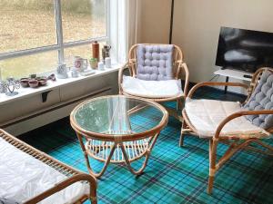 O zonă de relaxare la 4 person holiday home in Rødby-By Traum