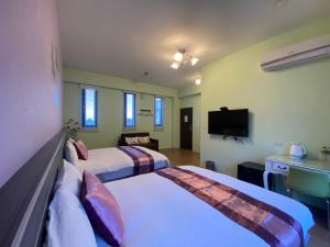 Postel nebo postele na pokoji v ubytování Dawn B&B