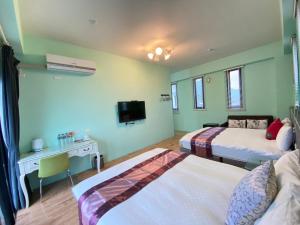 Postel nebo postele na pokoji v ubytování Dawn B&B