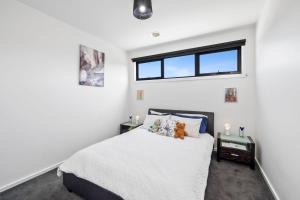 Postel nebo postele na pokoji v ubytování Muirfield Beach House 3a