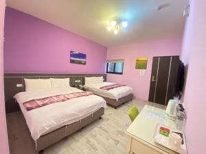 Postel nebo postele na pokoji v ubytování Dawn B&B