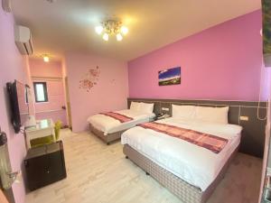 Postel nebo postele na pokoji v ubytování Dawn B&B