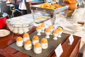 a group of eggs inachedached chickens on a table at Centara Chaan Talay Resort And Villas Trat in Ban Khlong Muang