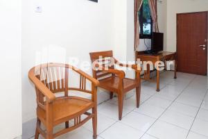 Χώρος καθιστικού στο Hotel Sebelas at Jalan Palasari Mitra RedDoorz