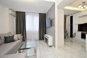 TV a/nebo společenská místnost v ubytování Apart House in centr Koghbaci strit