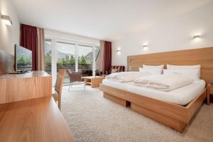 Postel nebo postele na pokoji v ubytování Alpen-Comfort-Hotel Central