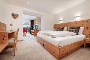 Postel nebo postele na pokoji v ubytování Alpen-Comfort-Hotel Central
