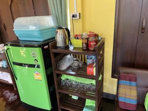 Kuchyň nebo kuchyňský kout v ubytování Sukhothai City Resort