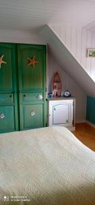 Posteľ alebo postele v izbe v ubytovaní Maison cosy à Quiberville - Idéal pour familles