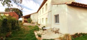 Zahrada ubytování Les Hauts de Grazac, Chambres et Tables d'hôtes