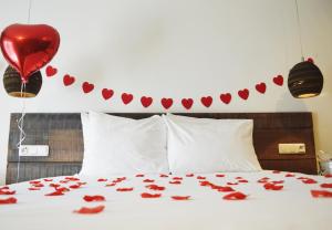 Ein Bett oder Betten in einem Zimmer der Unterkunft Van Heeckeren Hotel