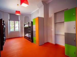 an empty room with colorful cabinets and shelves in a room at BANANA'S CAMP in Cannes