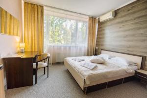 Postel nebo postele na pokoji v ubytování SPA Hotel Zhyva Voda + 37 fotografií