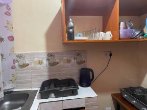 Kuchyň nebo kuchyňský kout v ubytování Cozy 2 bedroom house near Rupa