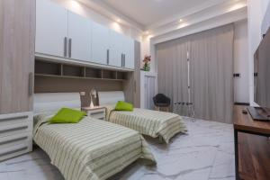 Posteľ alebo postele v izbe v ubytovaní Mini Loft San Carlo a 5 min da MAMbo Bologna